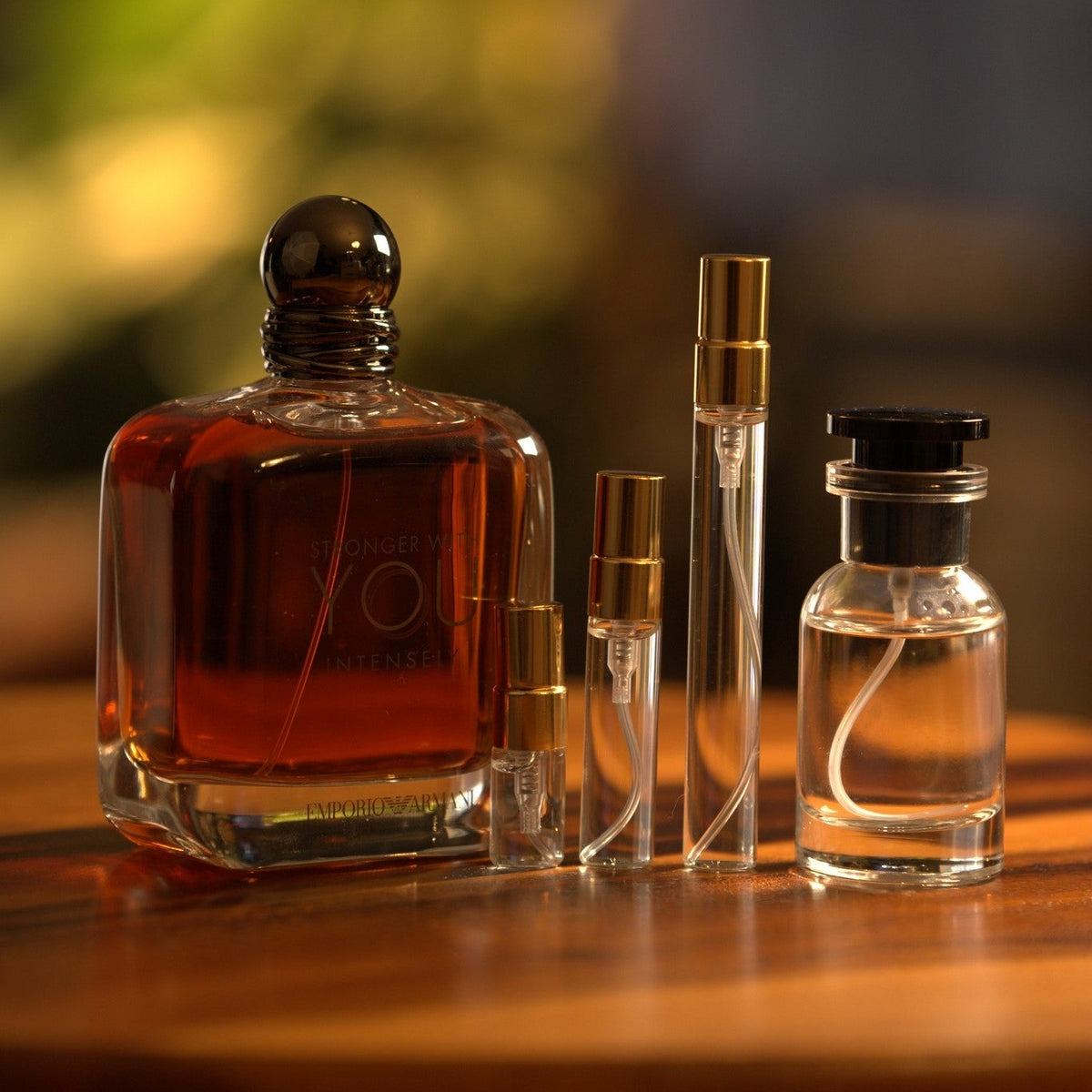 emporio-armani-stronger-with-you-intensely decant bottle and vials