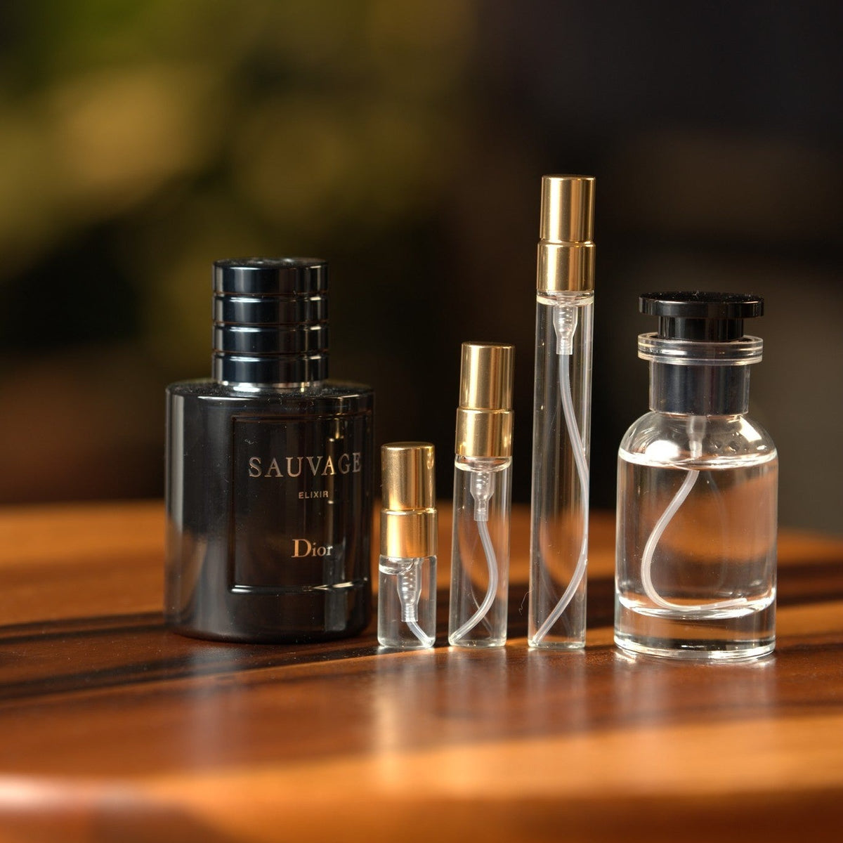 dior-sauvage-elixir decant bottle and vials