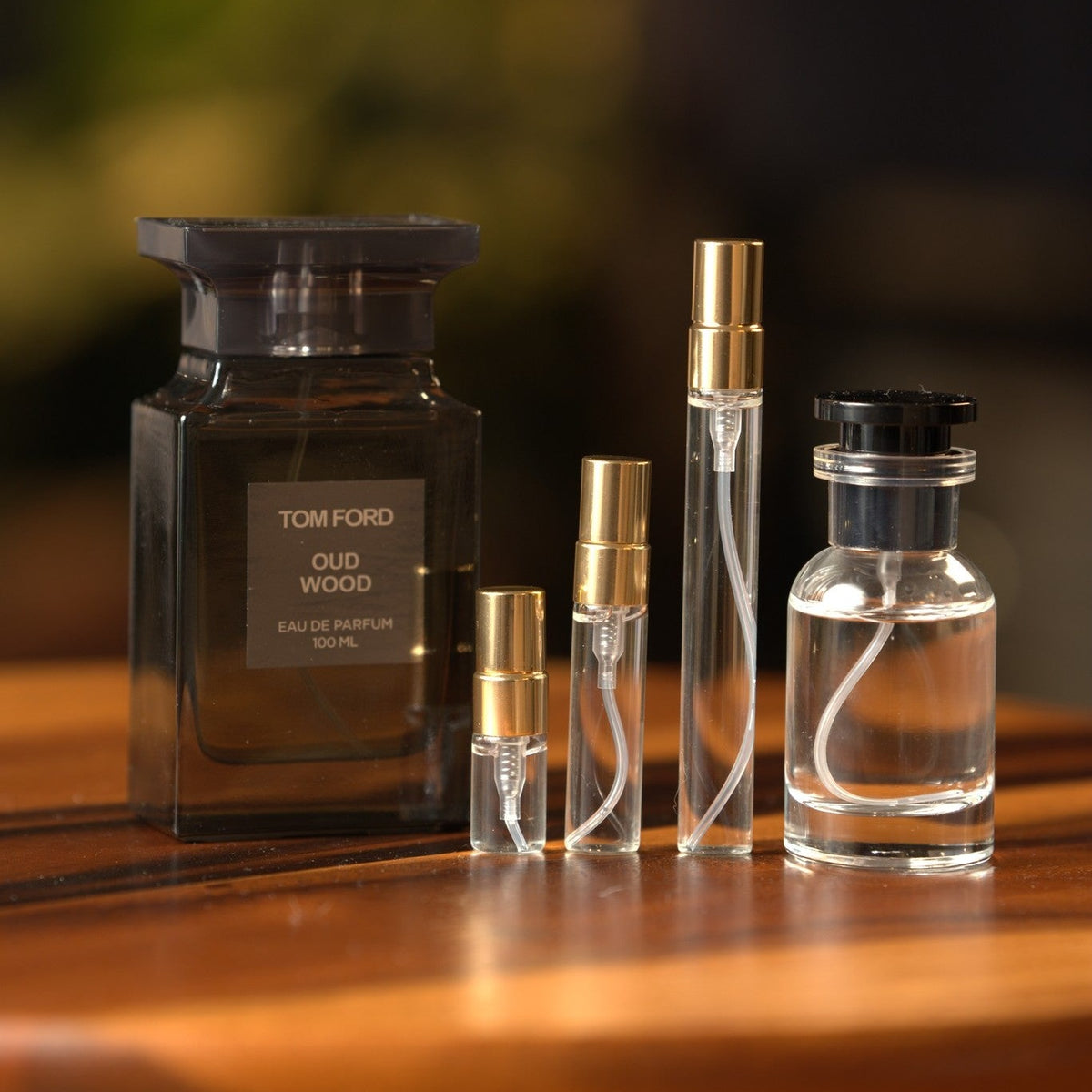 tom-ford-oud-wood decant bottle and vials