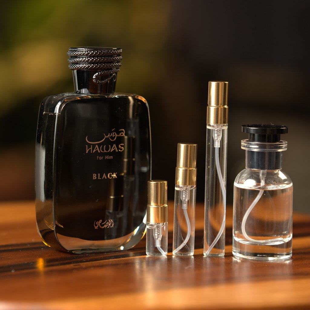 rasasi-hawas-black-decanted-by-queen-city-apothecary decant bottle and vials