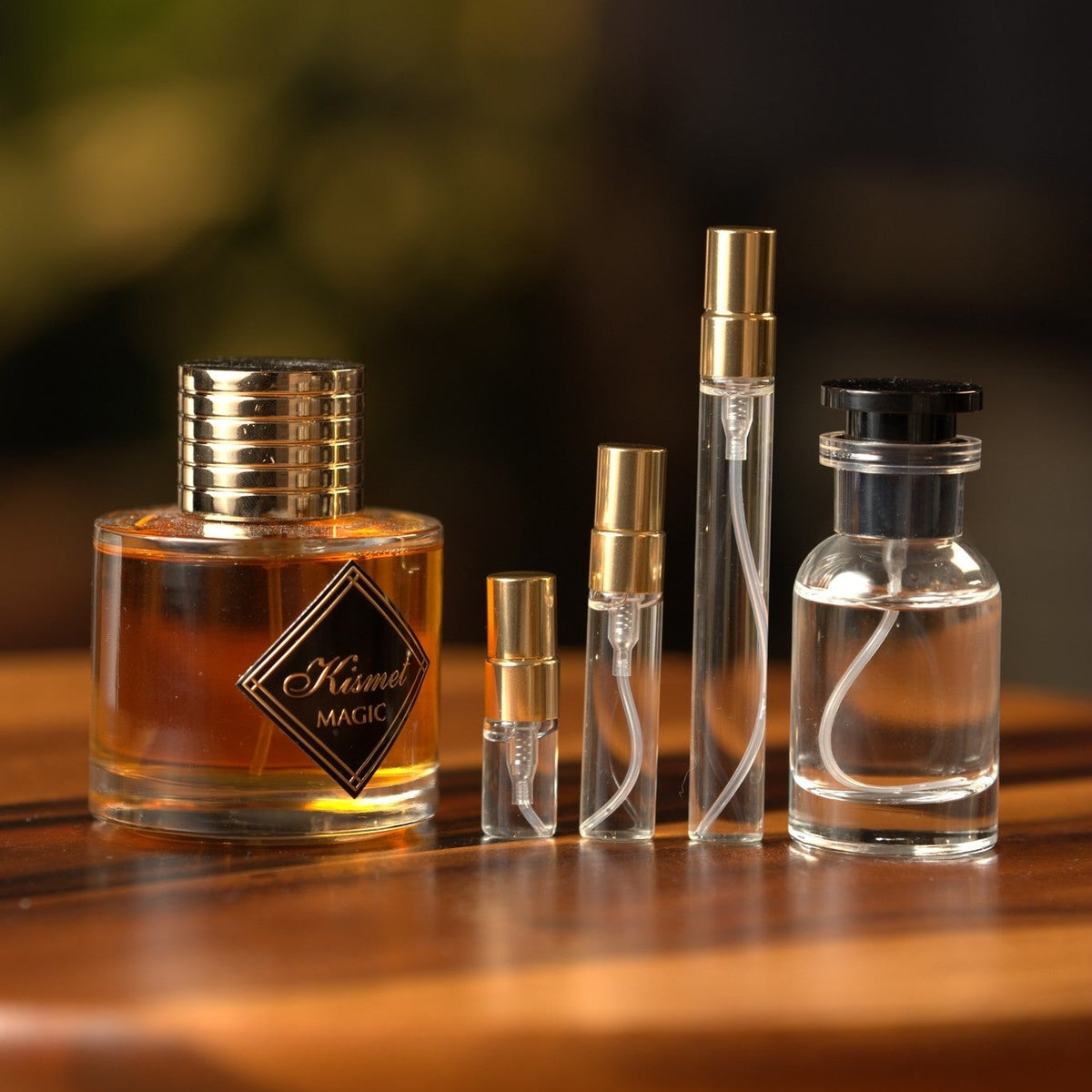 lattafa-alhambra-kismet-magic decant bottle and vials