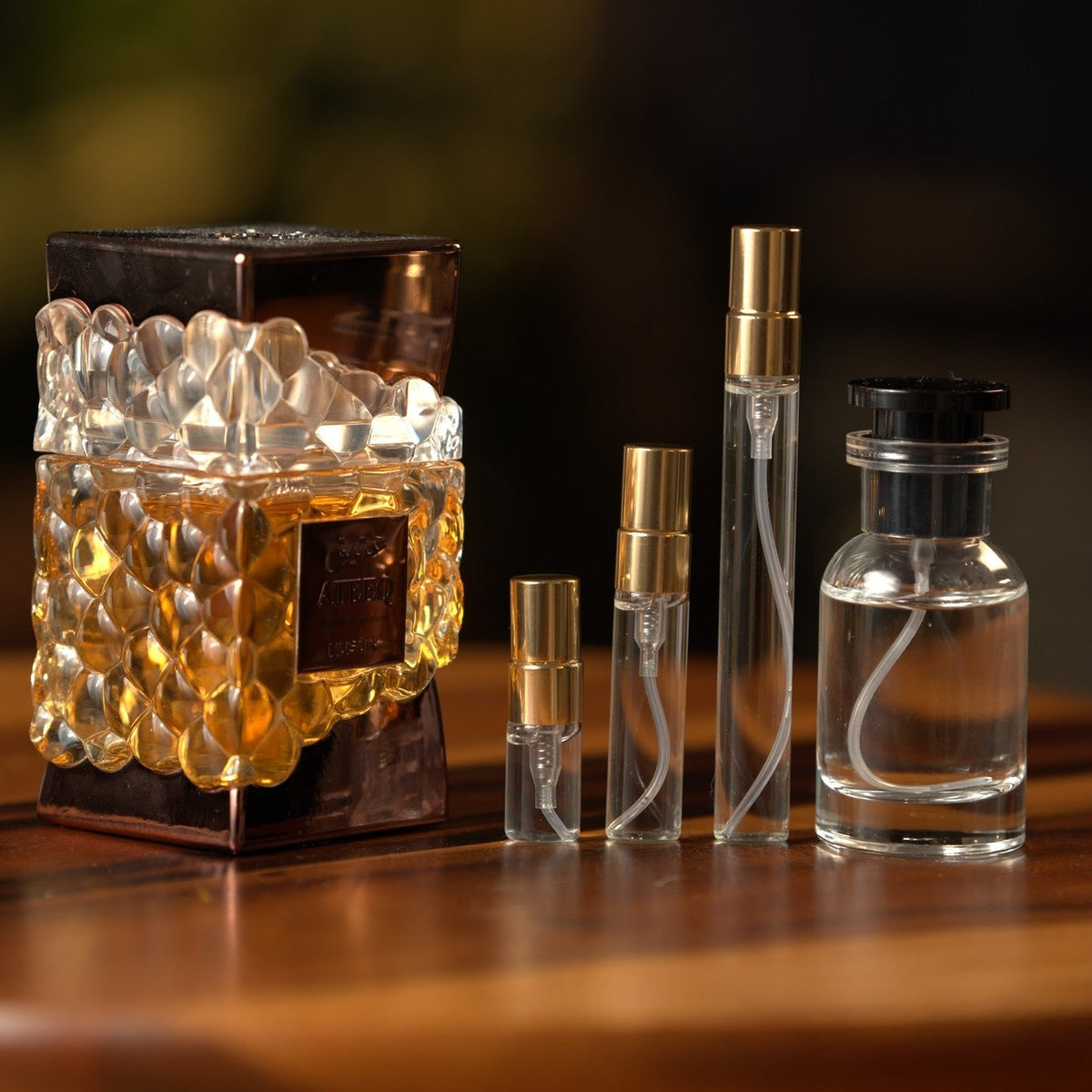 nusuk-ateeq decant bottle and vials