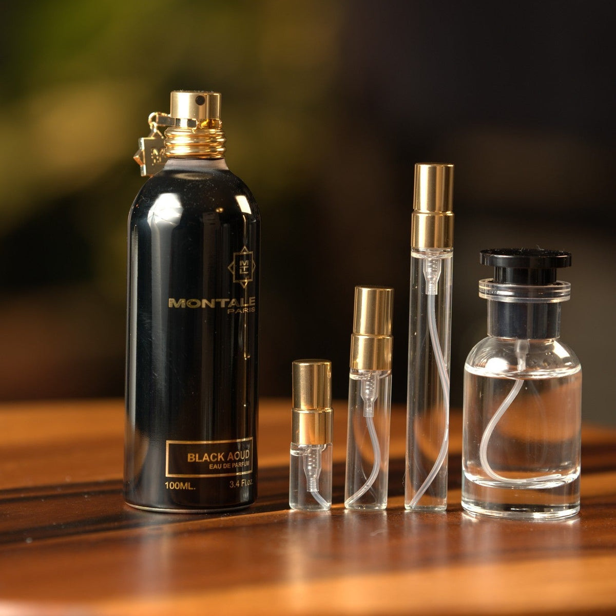 montale-black-aoud decant bottle and vials
