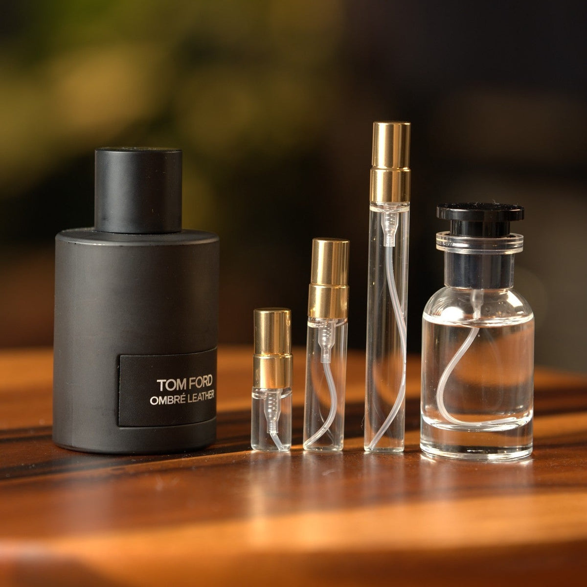 tom-ford-ombre-leather-edp decant bottle and vials