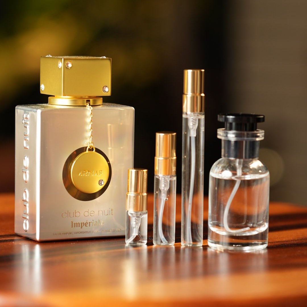 armaf-club-de-nuit-imperiale-white decant bottle and vials