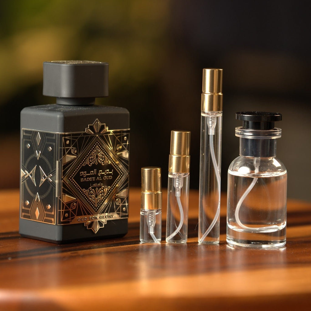 lattafa-badee-al-oud-oud-for-glory decant bottle and vials