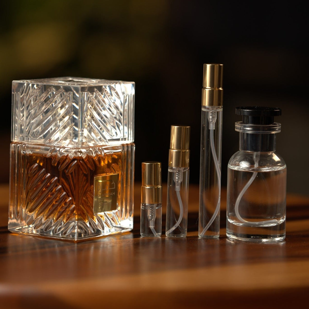 lattafa-khamrah decant bottle and vials