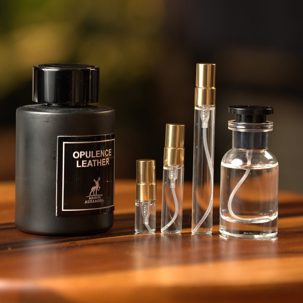 lattafa-maison-alhambra-opulence-leather decant bottle and vials
