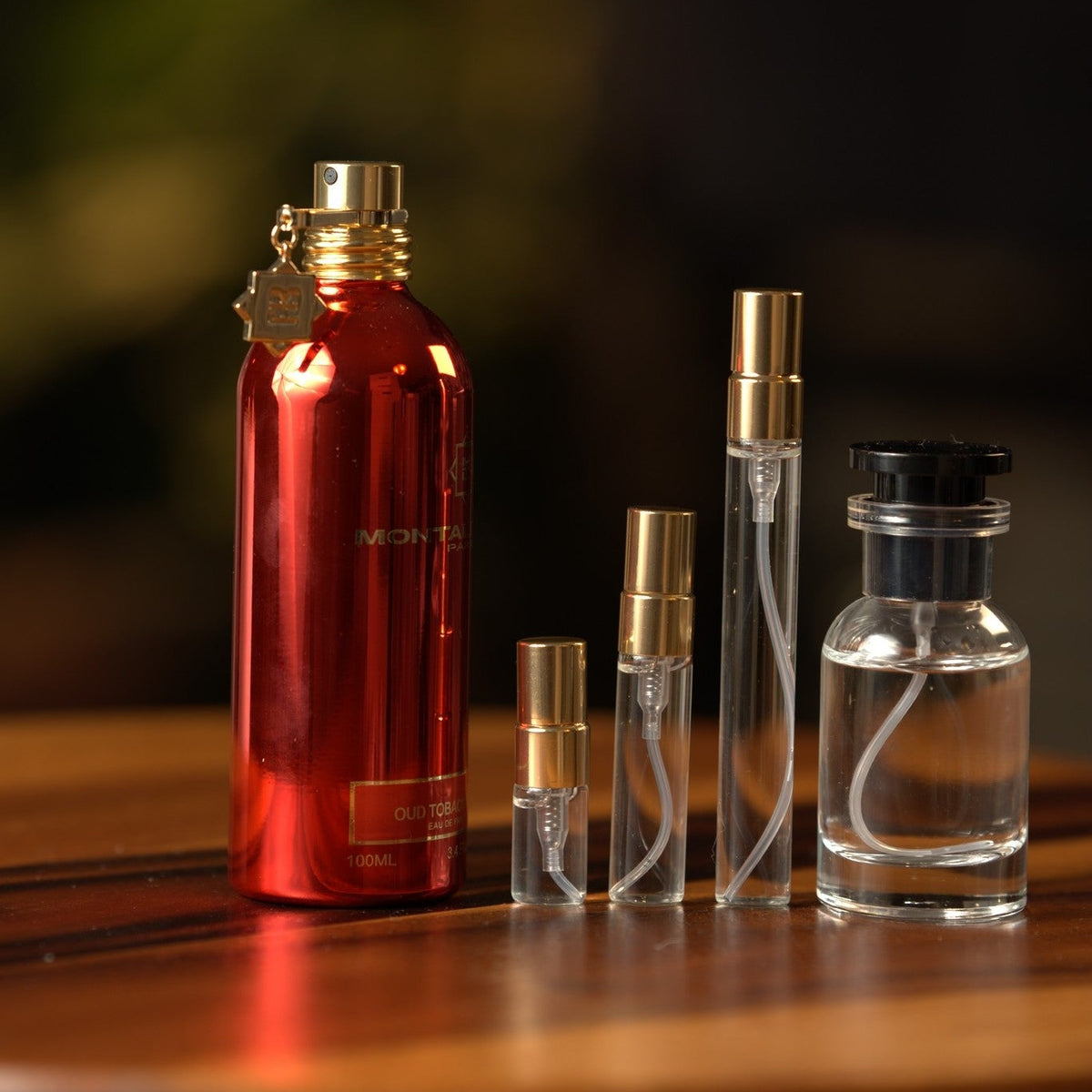 montale-oud-tobacco decant bottle and vials