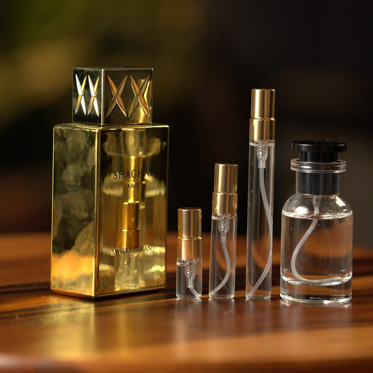swiss-arabian-shaghaf-oud decant bottle and vials