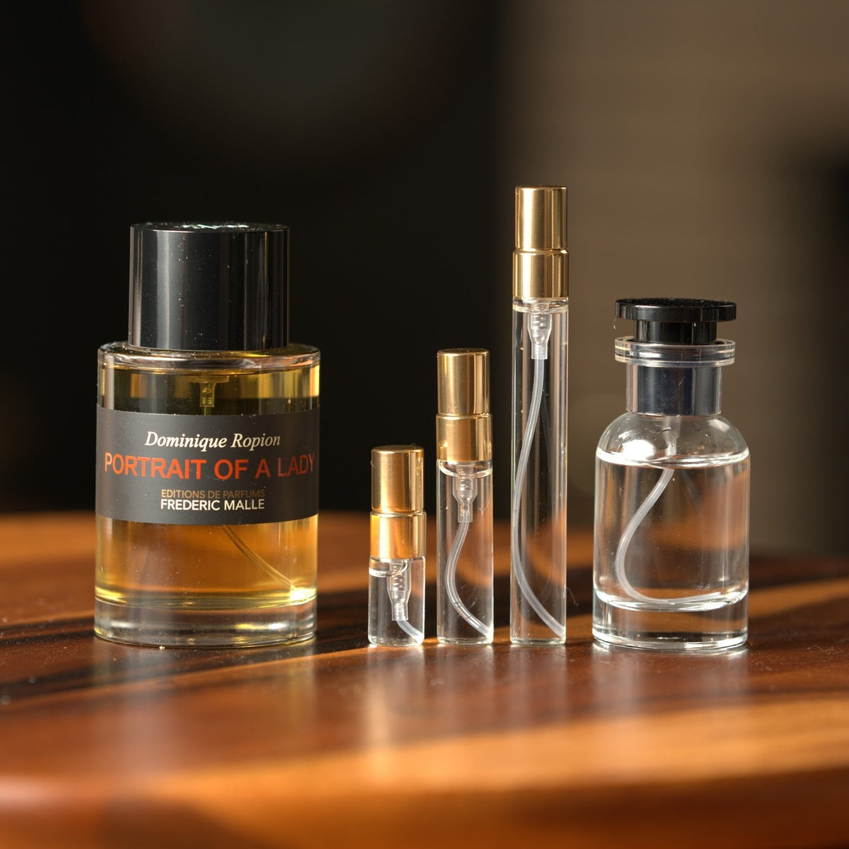 Frédéric Malle Portrait of a Lady bottle with Atelier Elemental decant vials