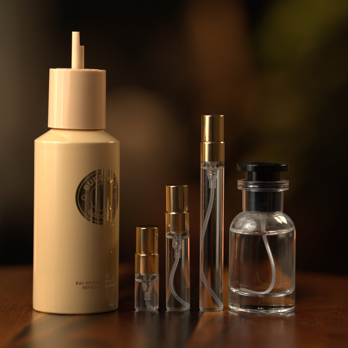 Burberry Goddess Intense EDP decant: full bottle beside 2 ml, 5 ml and 10 ml Atelier Elemental vials