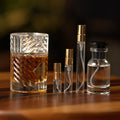 kilian-angels-share decant bottle and vials
