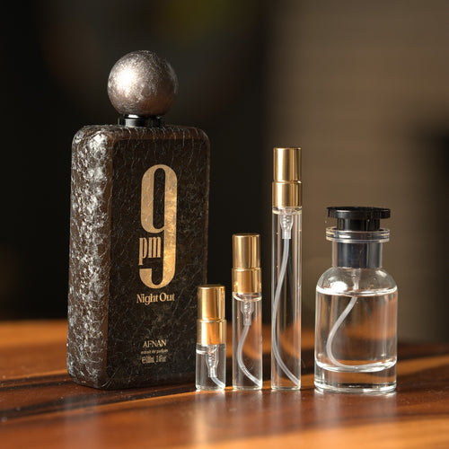 Afnan 9pm Night Out bottle with Atelier Elemental decant vials