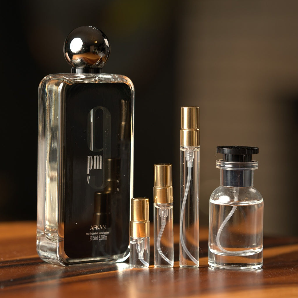 Afnan 9pm bottle with Atelier Elemental decant vials