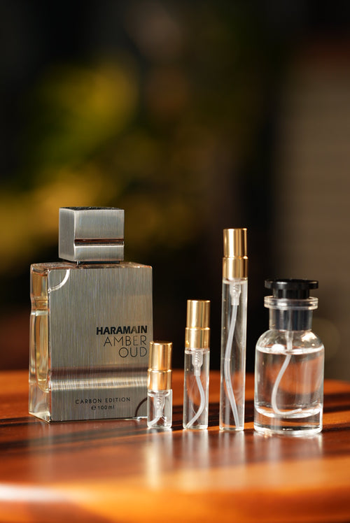 AL HARAMAIN AMBER OUD CARBON EDITION EDP bottle and decant vials