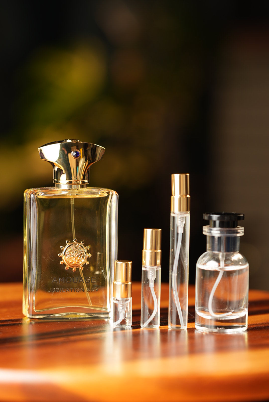 AMOUAGE JUBILATION XXV EDP bottle and decant vials