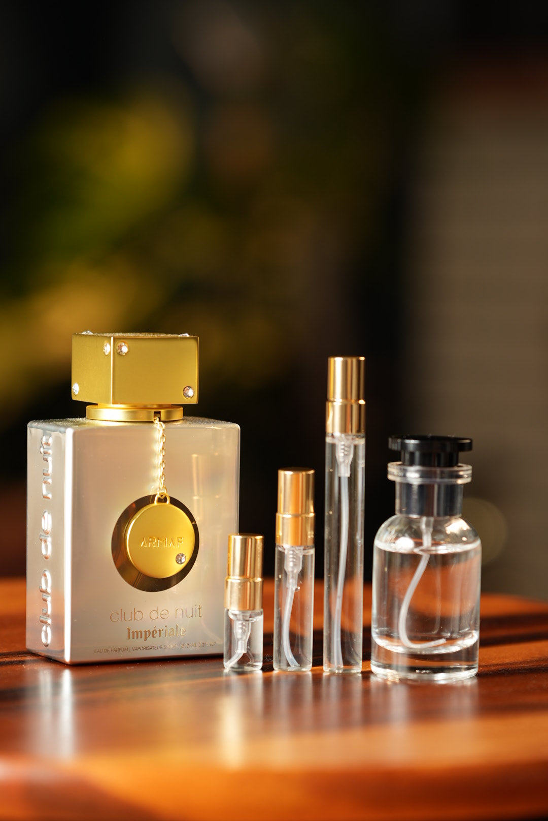 ARMAF CLUB DE NUIT WHITE IMPERIALE bottle and decant vials