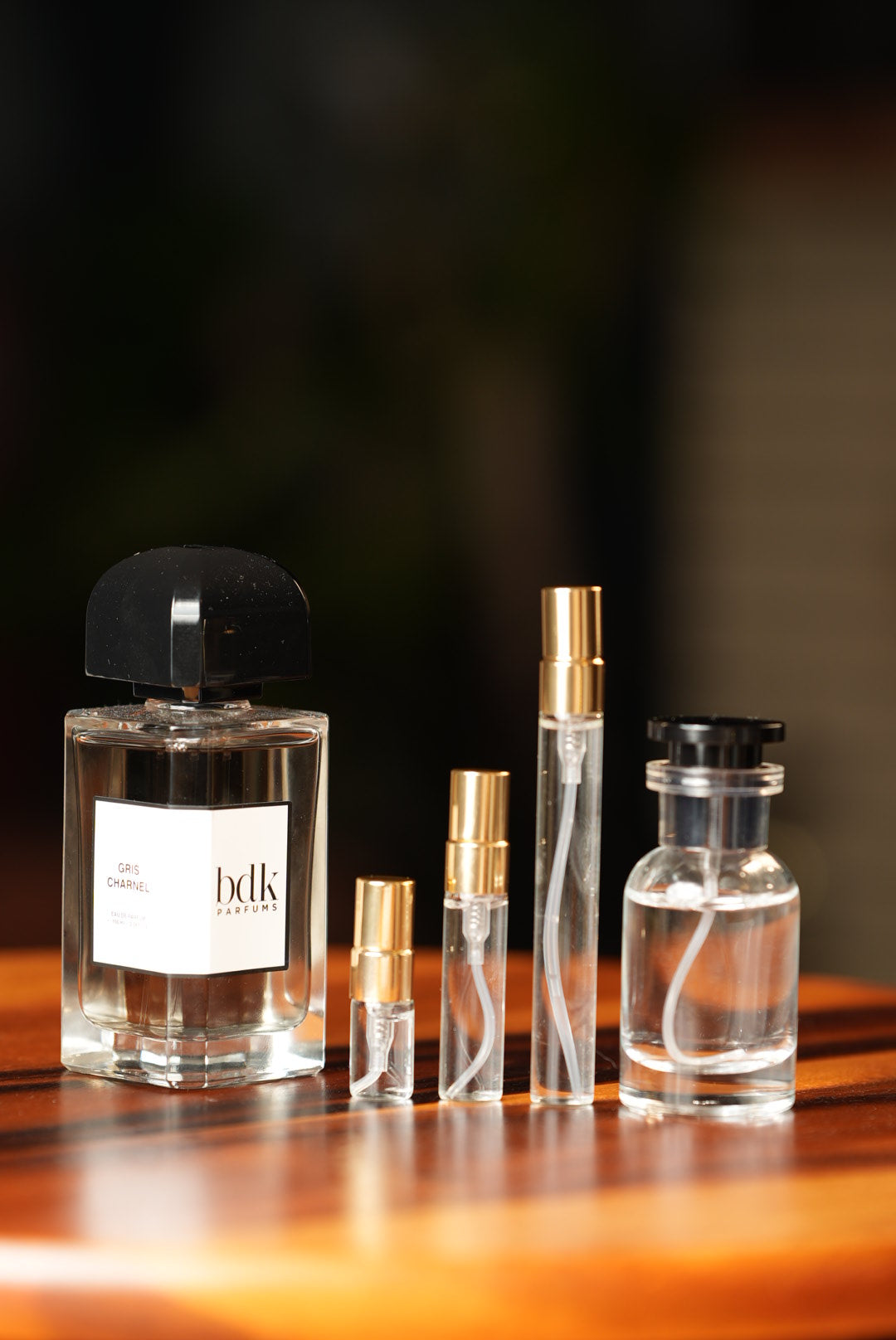 BDK PARFUMS GRIS CHARNEL EDP bottle and decant vials