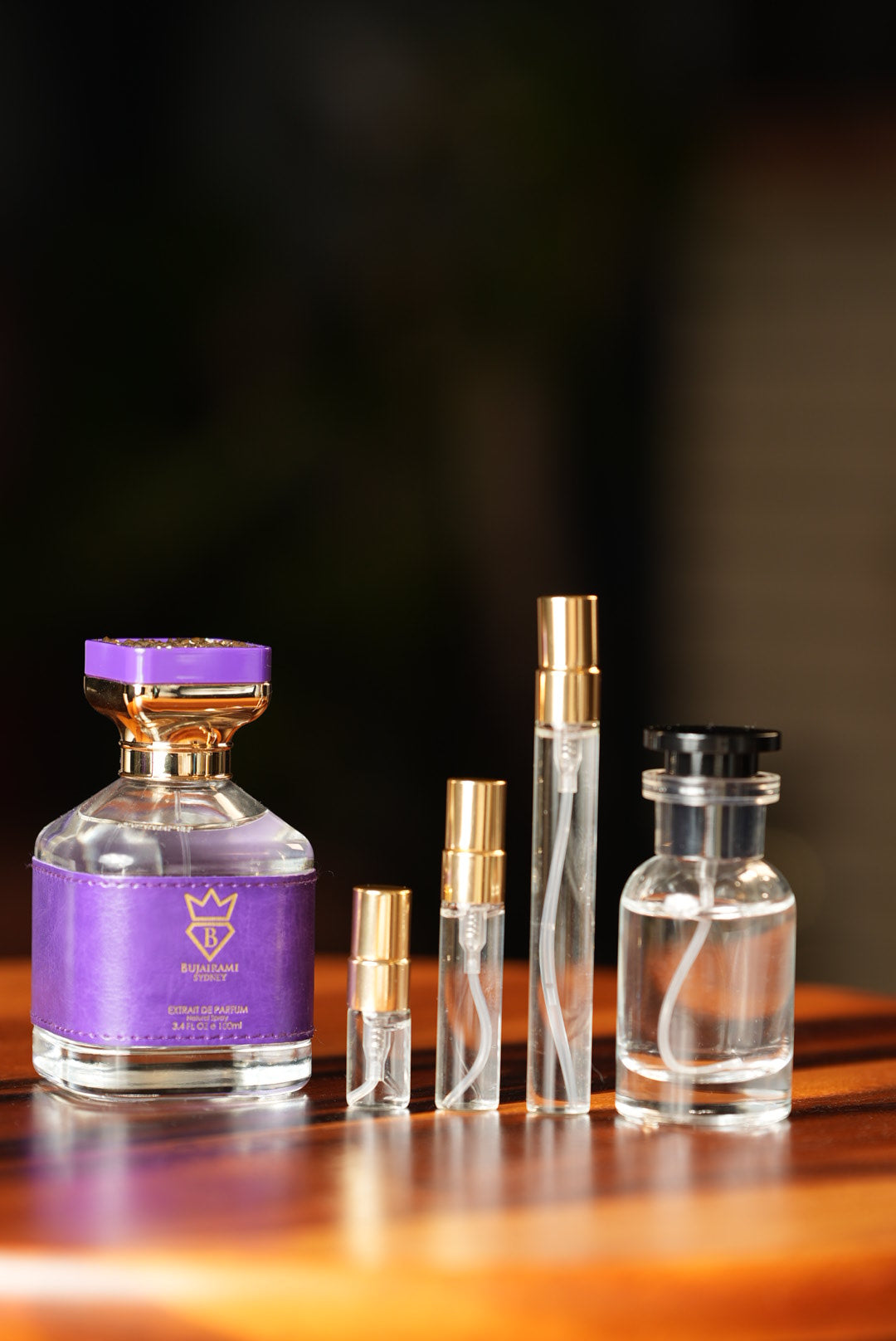 BUJAIRAMI COSMIC FEVER EXTRAIT bottle and decant vials