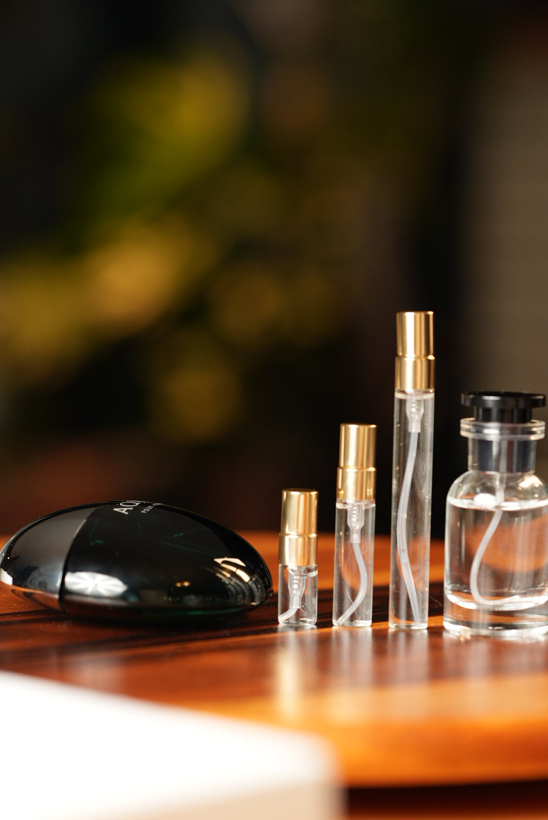 BVLGARI AQVA POUR HOMME EDT bottle and decant vials