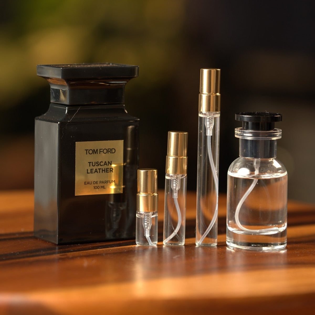 tom-ford-tuscan-leather decant bottle and vials