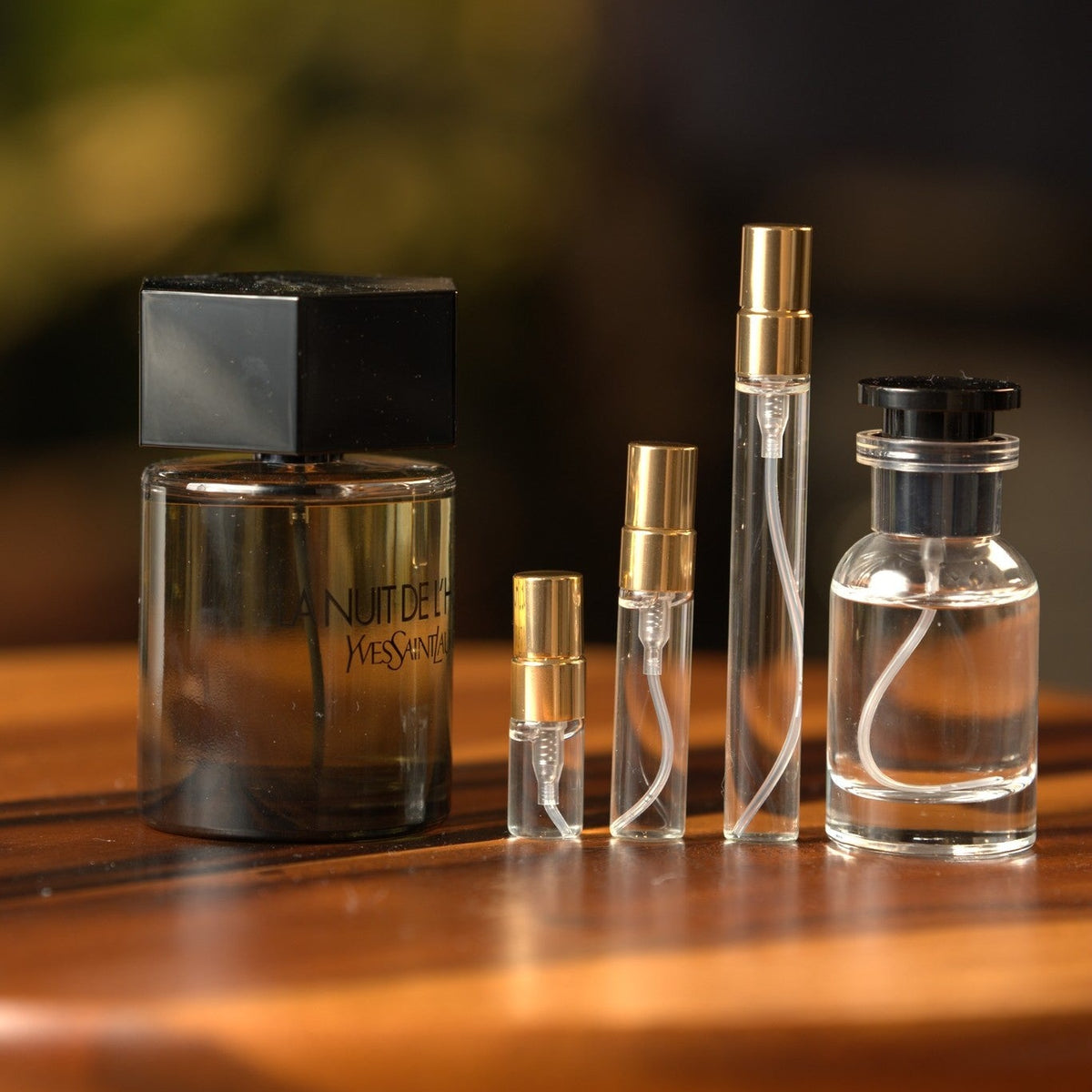 yves-saint-laurent-la-nuit-de-lhomme decant bottle and vials