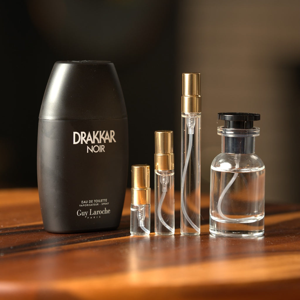 Guy Laroche Drakkar Noir bottle with Atelier Elemental decant vials