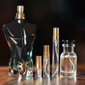 JEAN PAUL GAULTIER LE BEAU LE PARFUM perfume bottle beside decant vials
