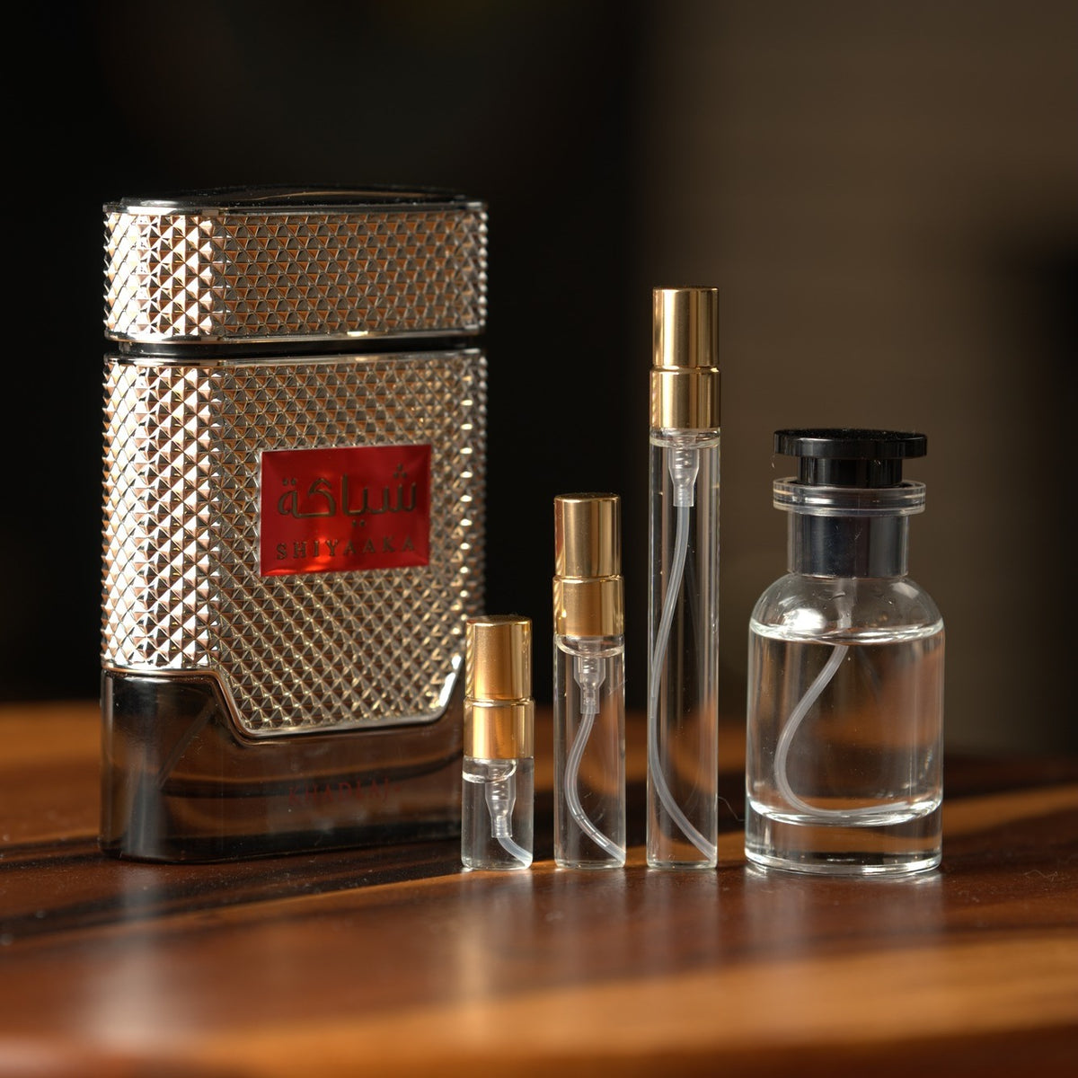 Khadlaj Shiyaaka Silver bottle with Atelier Elemental decant vials