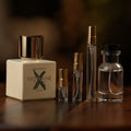 Nishane Hacivat X extrait de parfum beside Atelier Elemental decant vials in 2 ml, 5 ml, 10 ml and 30 ml sizes