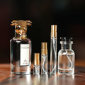 Penhaligon's The Blazing Mr Sam Eau de Parfum bottle beside Atelier Elemental decant vials