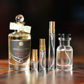 Penhaligon's Halfeti Eau de Parfum bottle beside Atelier Elemental decant vials