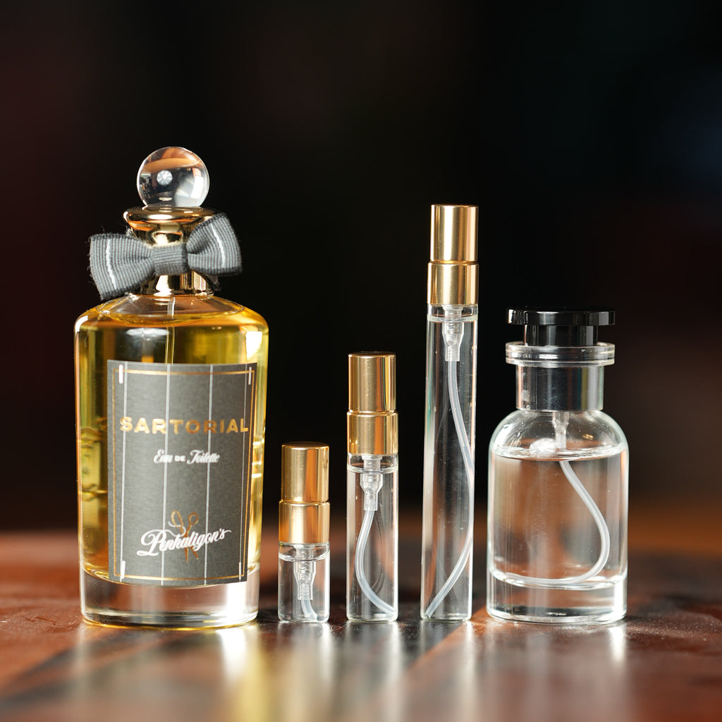 Penhaligon's Sartorial Eau de Toilette bottle beside Atelier Elemental decant vials