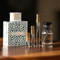 Rayhaan Azul bottle with Atelier Elemental decant vials