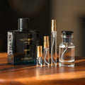 Rayhaan Nocturno Pour Homme Elixir bottle with Atelier Elemental decant vials