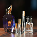 XERJOFF TORINO21 perfume bottle beside decant vials
